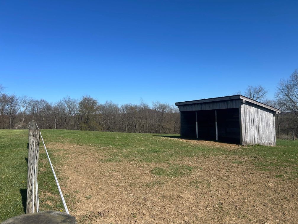 Pristine equestrian estate facilities including riding arenas and trails